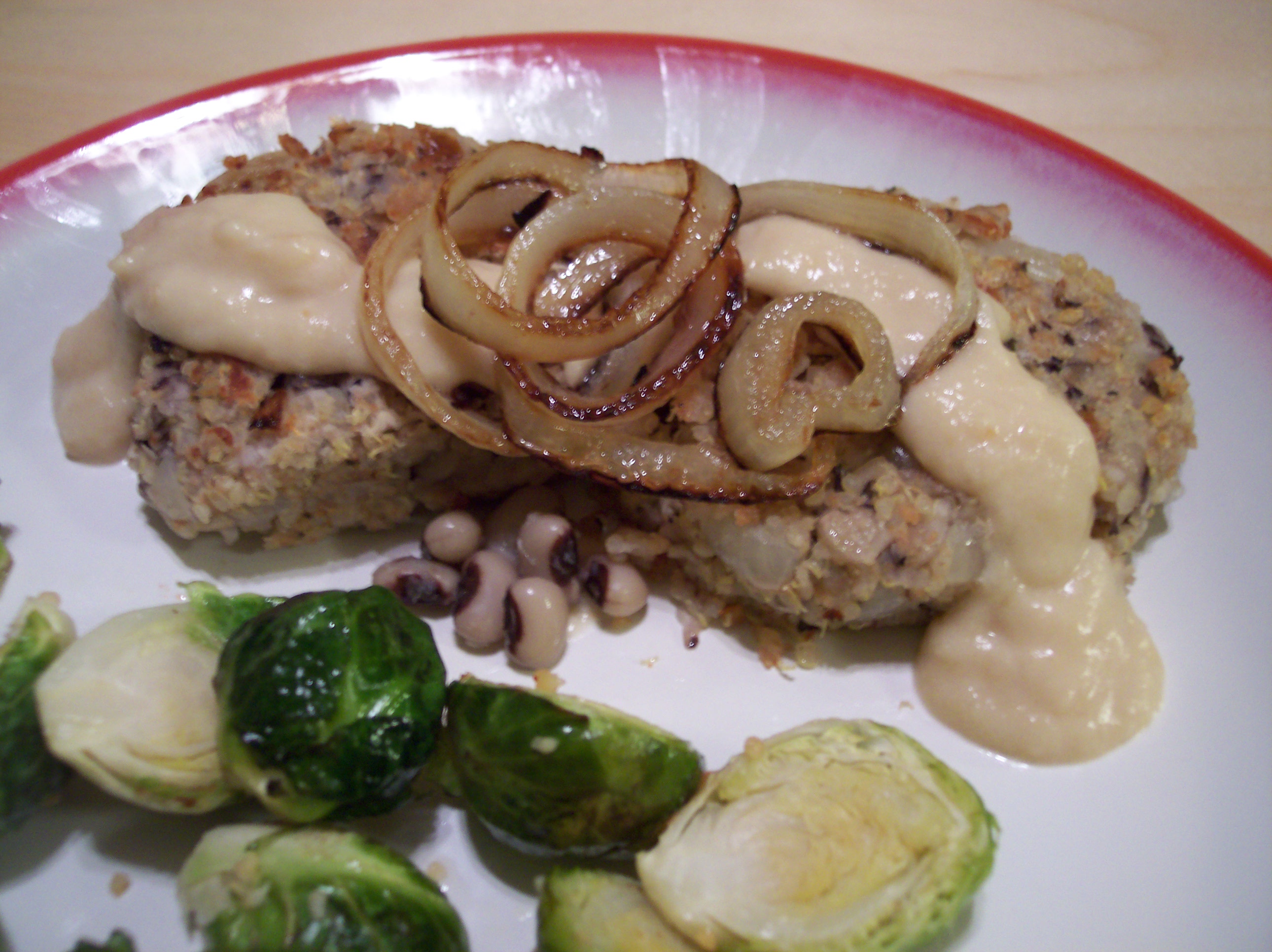 Black-eyed Pea and Quinoa Cakes with Roasted Garlic Sauce and Carmelized Onions